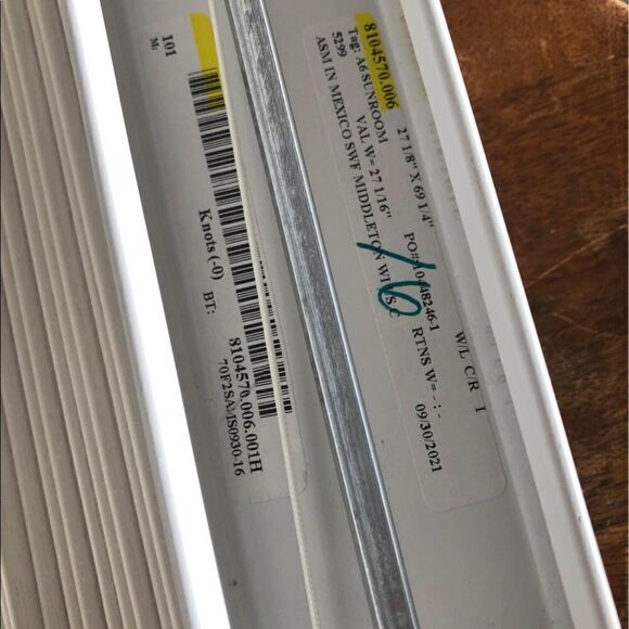 Bali faux wood blinds 27” by 69”. - Picture 2 of 4